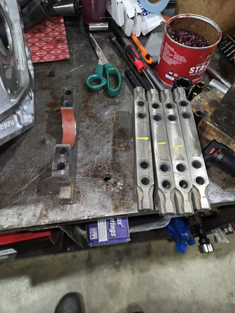 Bearing caps laid out during engine assembly