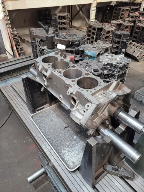 Engine block secured on a machining fixture