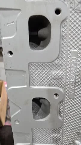 HEMI cylinder-head port face