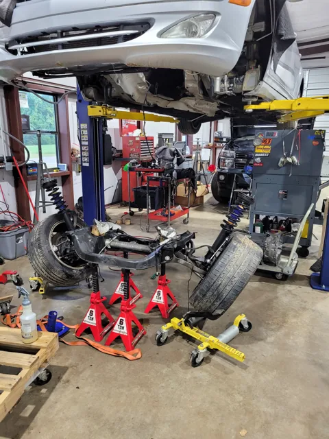 Vehicle raised with drivetrain components below
